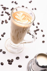Hot Cappuccino  coffee  in clear glass on a white background in the studio.	