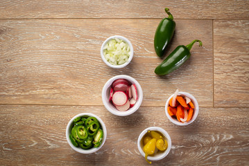 Seperate bowls of spicy ingredients