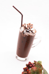 Cool cocoa  in clear glass on a white background in the studio.	