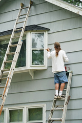 handyman painting house external wall for home renovation © nd700