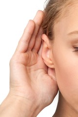Closeup on a Woman Holding her Hand Near her Ear