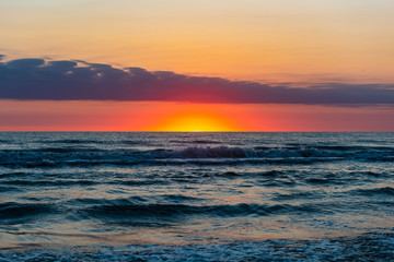 Amazing beautiful sunrise at the sea