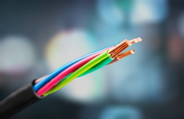 Four core armored cooper cable on  background