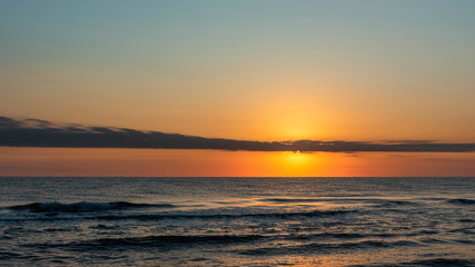 Obraz premium Sea surface during sunrise