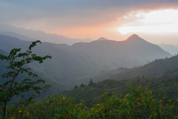 The sun is falling on a high mountain in Thailand.