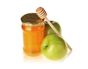 Jar of Honey with Green Apples and Honey Dipper