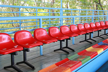 Red seats on the row.