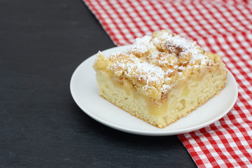 apple cake  on black slate