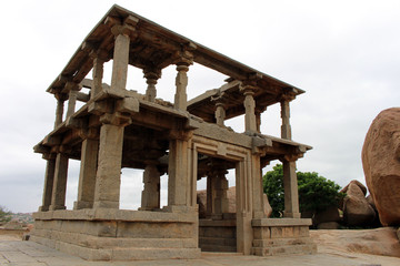 The formation of pillars, ruins, rocks, and Group Monuments of Temples in Hampi.