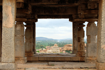 The formation of pillars, ruins, rocks, and Group Monuments of Temples in Hampi.