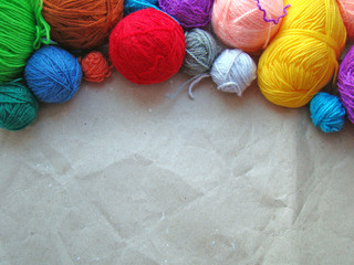 A sheet of paper in a string of threads