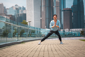 Urban woman doing workout in the city