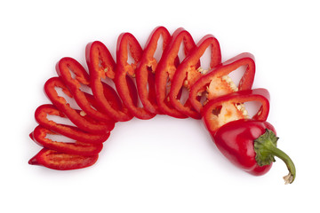 Sliced red pepper lies in a semicircle on a white background isolated top view