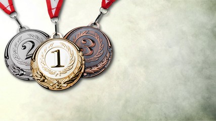 Gold, silver and bronze medals with ribbons