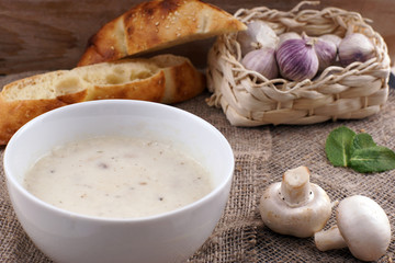 Turkish national mushroom rice soup with mint in a white plate