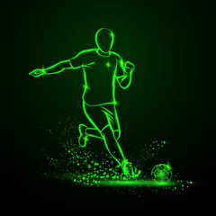 Green Neon soccer striker. Football player hits the ball in the dark under the rain.