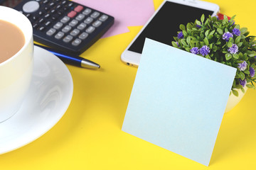 Empty card with coffee and phone