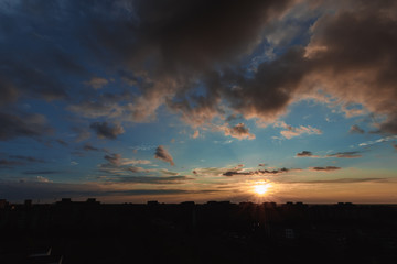 Beautiful foggy landscape, sunset. The fog glowing in the sunlight, above the meadow grass.