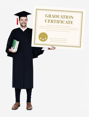 Male grad holding a graduation certificate