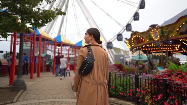 girl walking through the amusement park