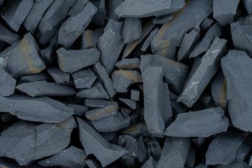 Close up black stone background.