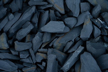 Close up black stone background.