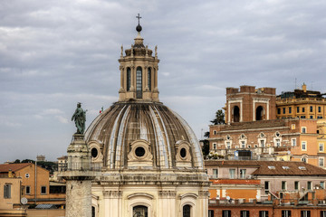 Fototapeta na wymiar Bird view of Church Santa Maria di Loreto and Traiano Column Monumento Nazionale a Vittorio Emanuele II. January, 2014.
