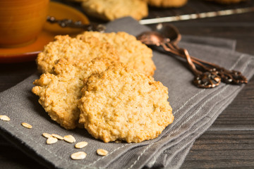 Cookies on grey tissue with for breakfast with tea or coffee, homemade oatmeal cookies