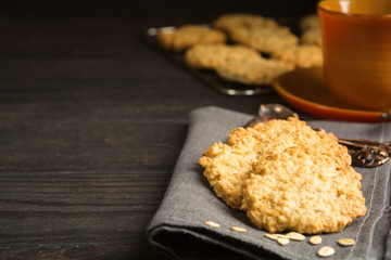 Homemade oatmeal cookies ready for breakfast or coffee break with copy space