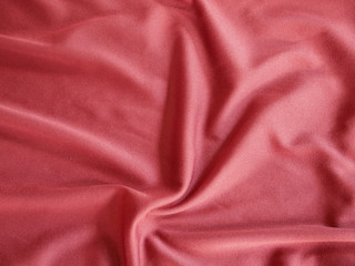 red silk textile background,texture of fabric