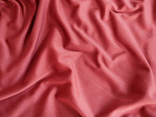 red silk textile background,texture of fabric