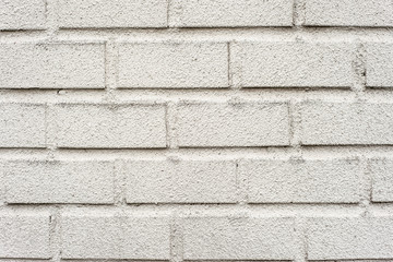 Obraz premium rough White painted brick wall for a background