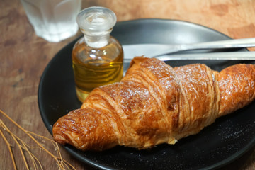croissants with honey on plate close yummy