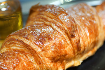 croissants with honey on plate close yummy
