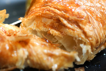 croissants with honey on plate close yummy