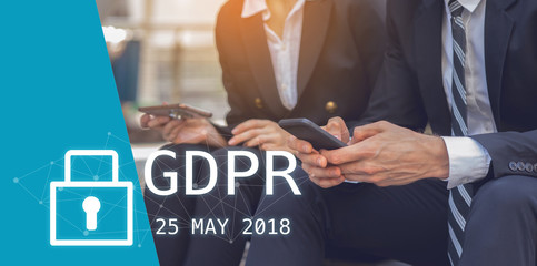 GDPR Concept,Businesspeople hand holding digital smartphone sign general data protection regulation and key icon, Cyber security and information privacy,25 may 2018.