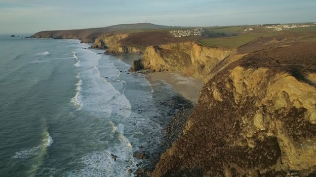 Sunset aerial overlooking the beach at Porthtowan Cornwall England UK