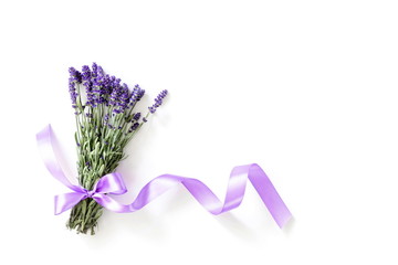 Lavender. Bunch fresh of lavender on white table background. Violet flowers. Greeting floral card with place for text. 