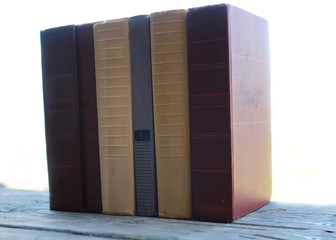 books standing on a table