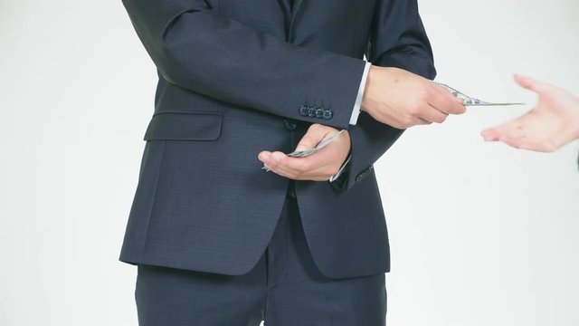 the concept of mediation and speculation. a person acquires an amount of money and gives less to the workers. The rest is taken away. 4k, slow motion
