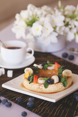 Coffee mousse served with fruits and berries