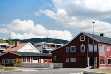 beautiful buildings under cloudy blue sky in Lillehammer, Oppland, Norway