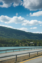 Fototapeta premium road near lake and mountains in Hallingskarvet National park, Norway