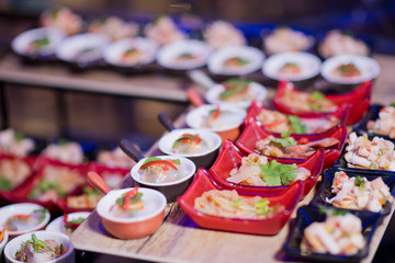 buffet food, catering food party at restaurant, mini canapes, snacks and appetizers