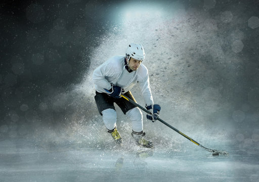 Caucsian ice hockey Players in dynamic action in a professional
