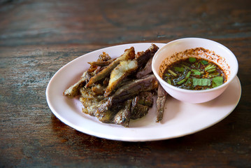 Roasted beef slice serve with spicy and sour sauce, Barbecue thai style. image for background, wallpaper and copy space
