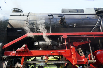 Steam locomotive detail on rails