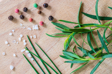 Spices. Salt, pepper, tarragon, chives and rosemary