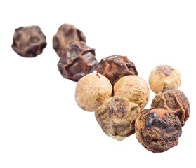 isolated group of black and white peppercorns