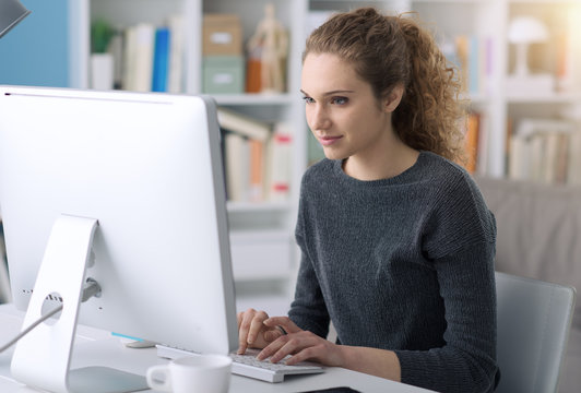 Young woman using a computer in the office